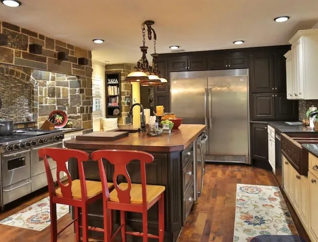 a view of a livingroom with furniture and toys