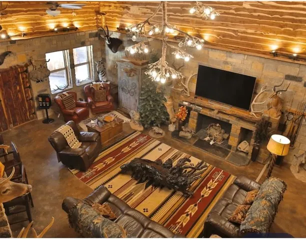 a balcony with table and chairs