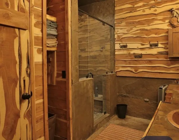 a view of a patio with table and chairs and potted plants