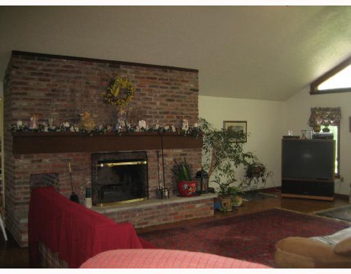 3881 Windover Road Murrysville, PA 15668 - Photo 3 of 8 Den/Family/Great Room. GREAT ROOM WITH BEAUTIFUL BRICK FIREPLACE AND WOOD FLOORS.