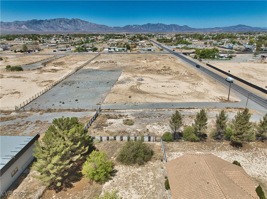 2121 East Manse Road Pahrump, NV 89048 - Photo 8 of 18 Overview of rural landscape featuring a mountainous background