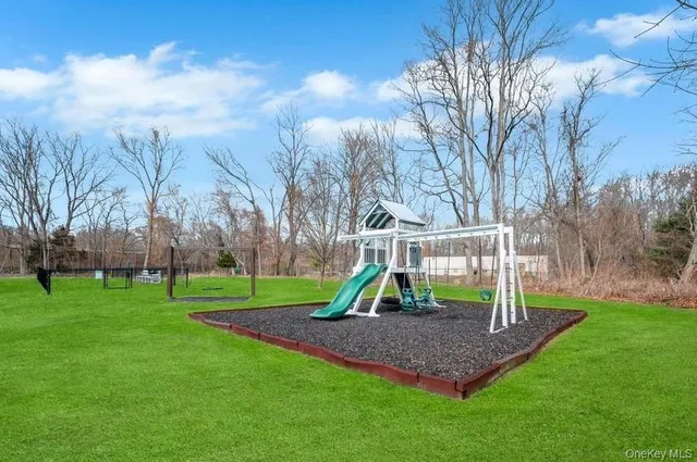 a view of park with small trees