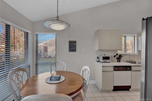 a view of a dining room with furniture