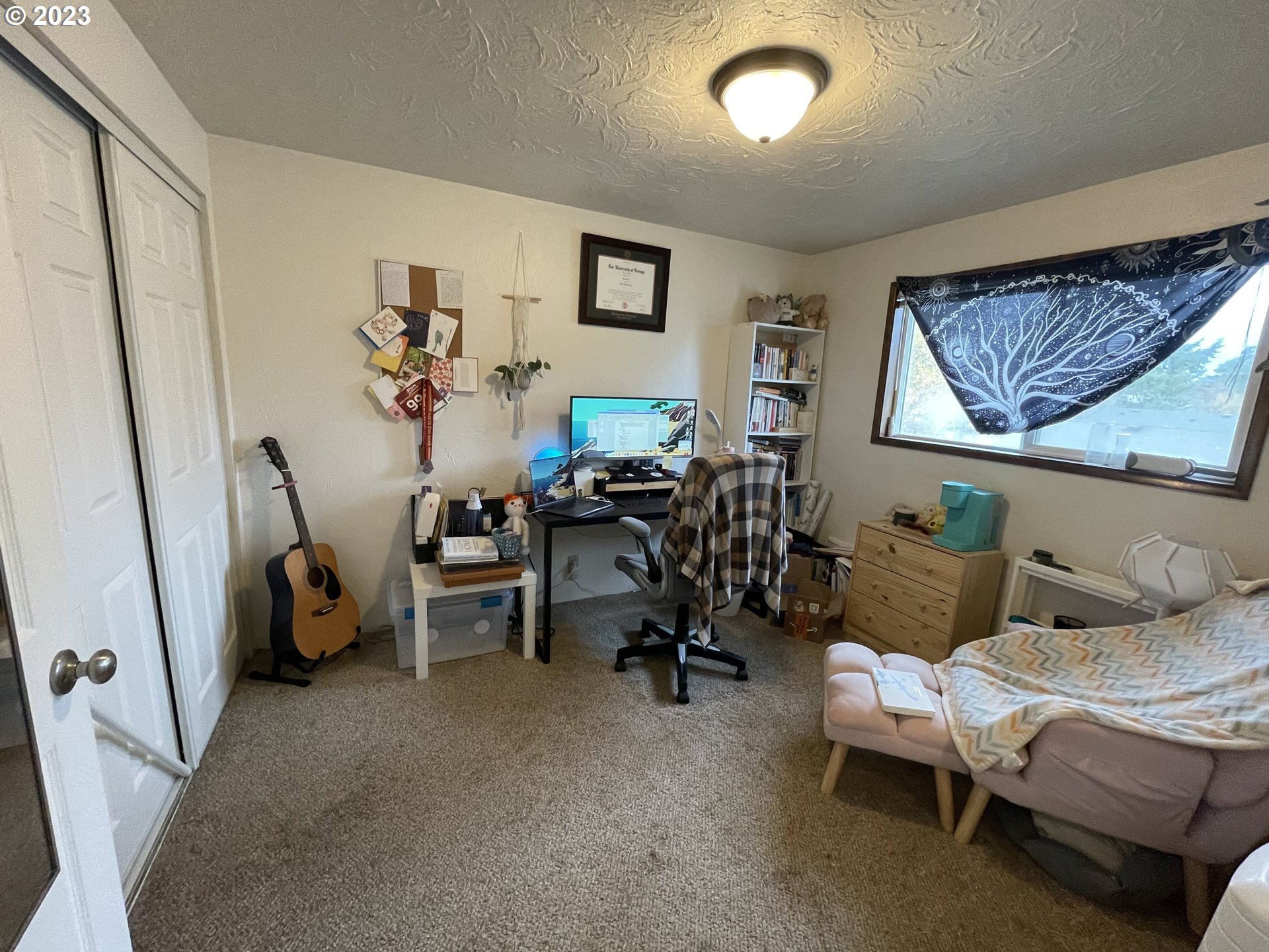 496 S Street Springfield, OR 97477 - Photo 7 of 11 a living room with furniture and a window