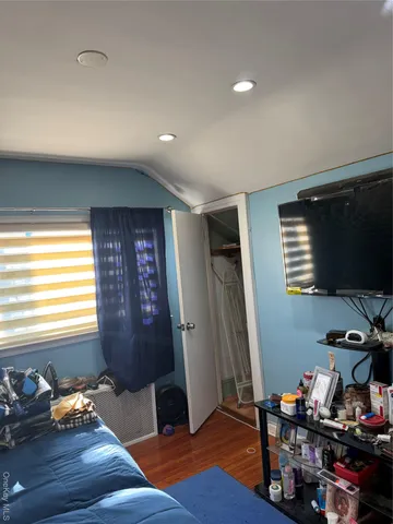 a room with furniture and a window