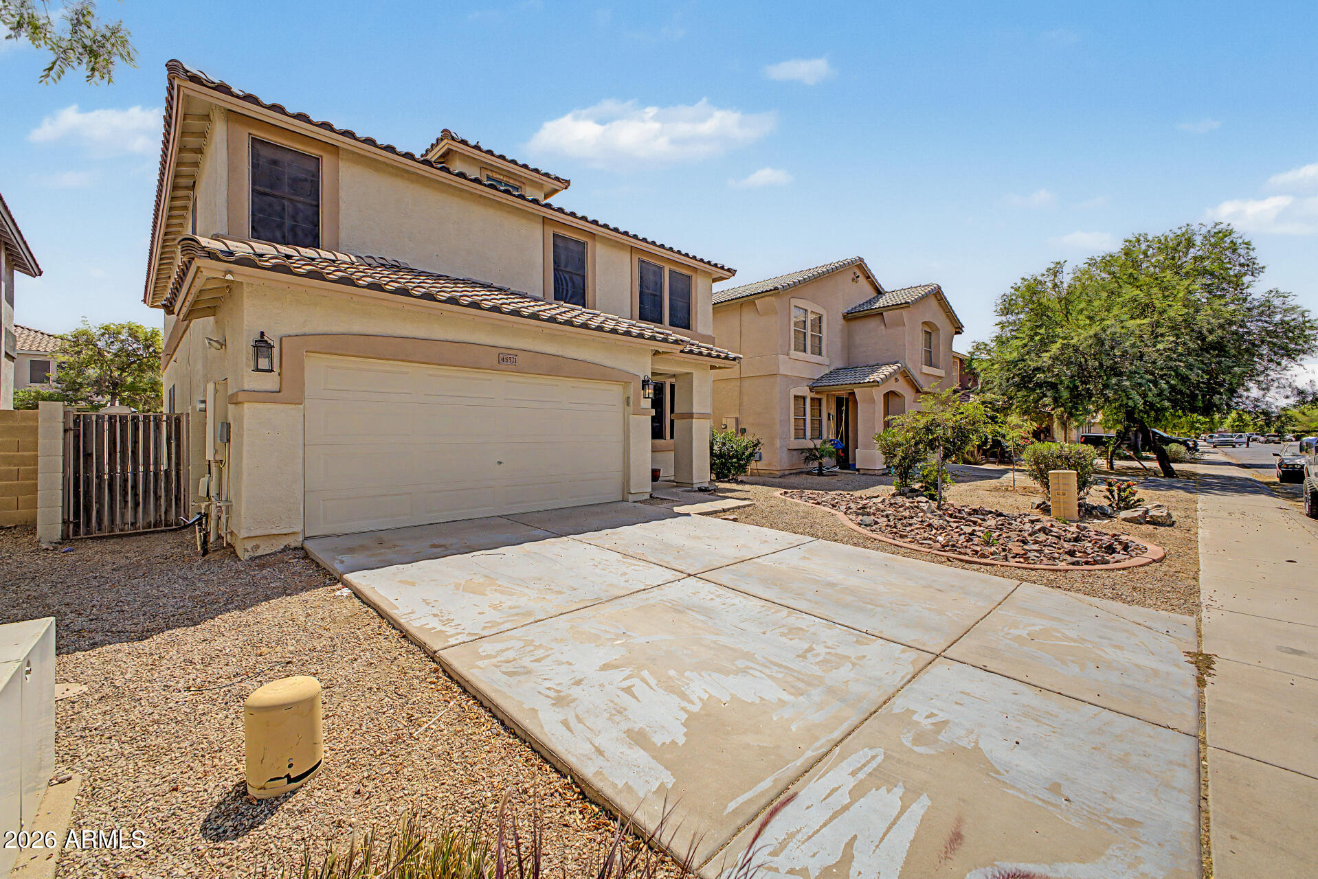 45571 West Tucker Road Maricopa, AZ 85139 - Photo 2 of 61 a front view of a building with many windows