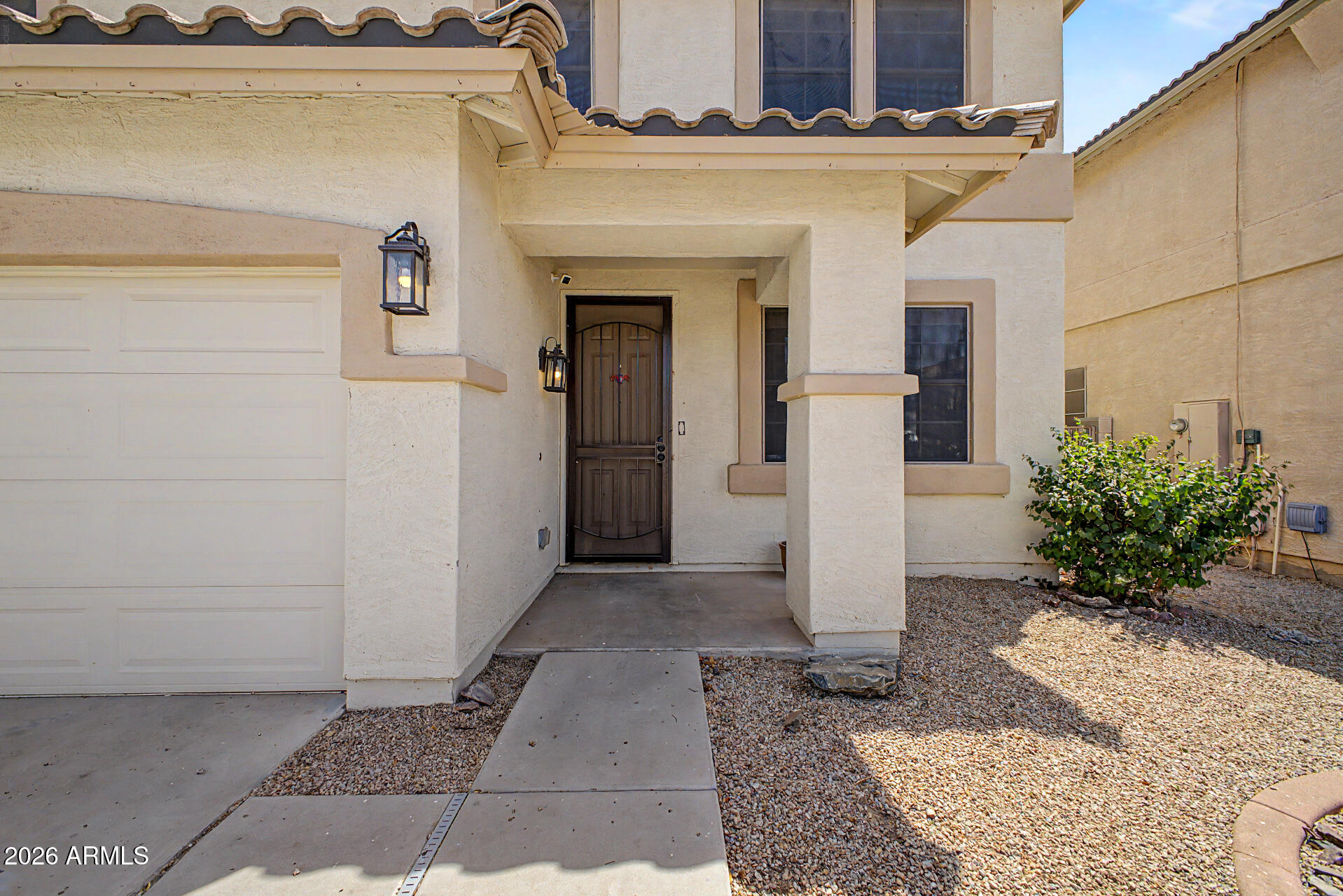 45571 West Tucker Road Maricopa, AZ 85139 - Photo 4 of 61 a view of a patio with table and chairs