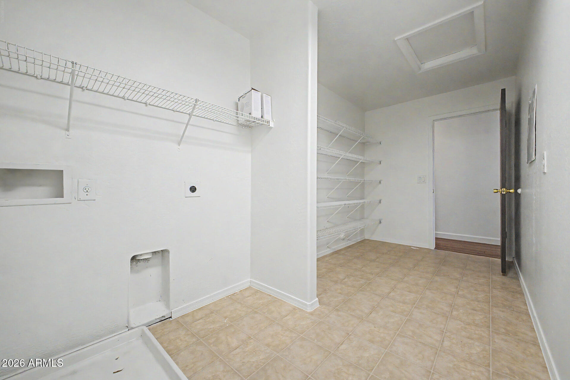 45571 West Tucker Road Maricopa, AZ 85139 - Photo 50 of 61 a view of a room with shelf