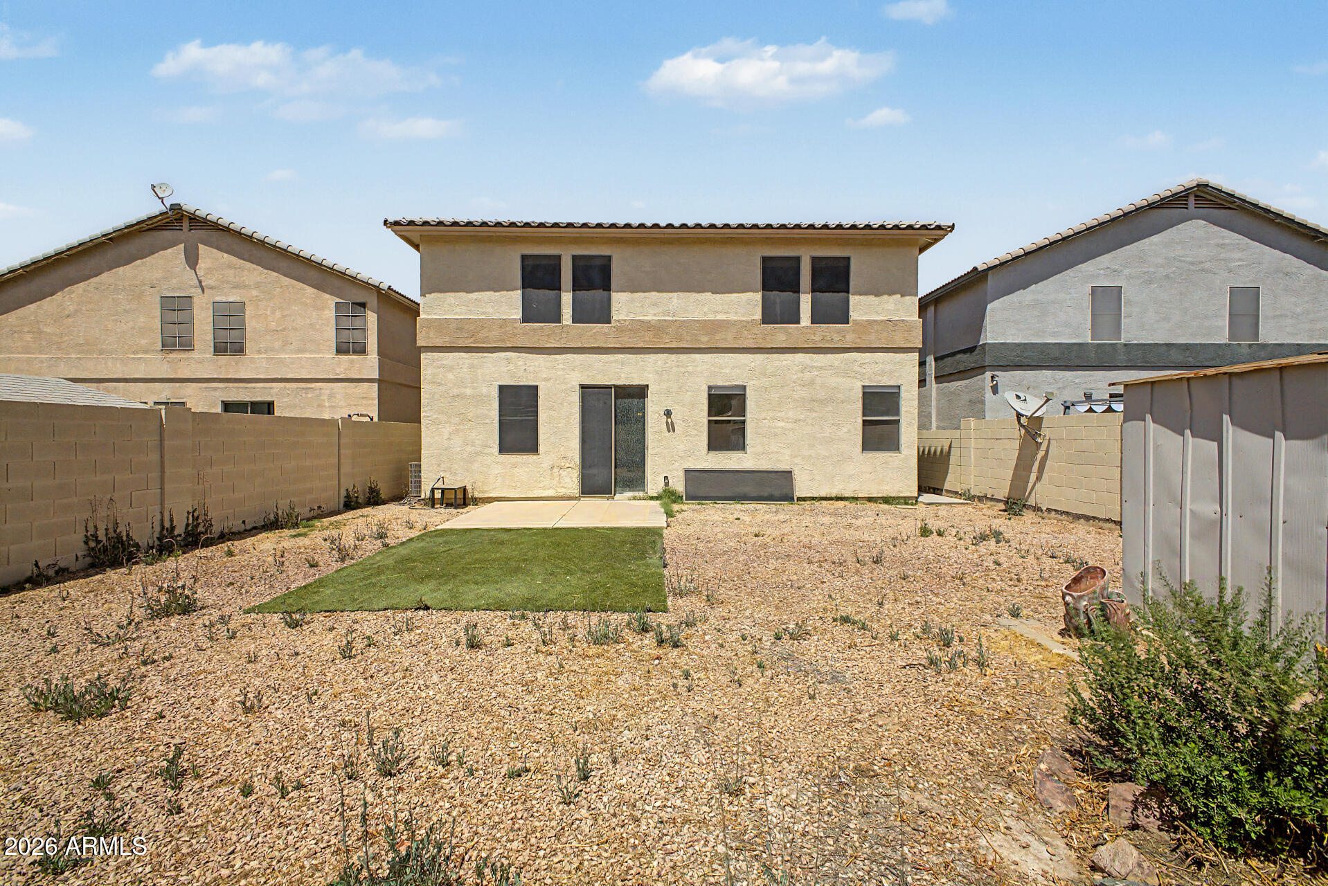 45571 West Tucker Road Maricopa, AZ 85139 - Photo 56 of 61 a front view of a house with a yard