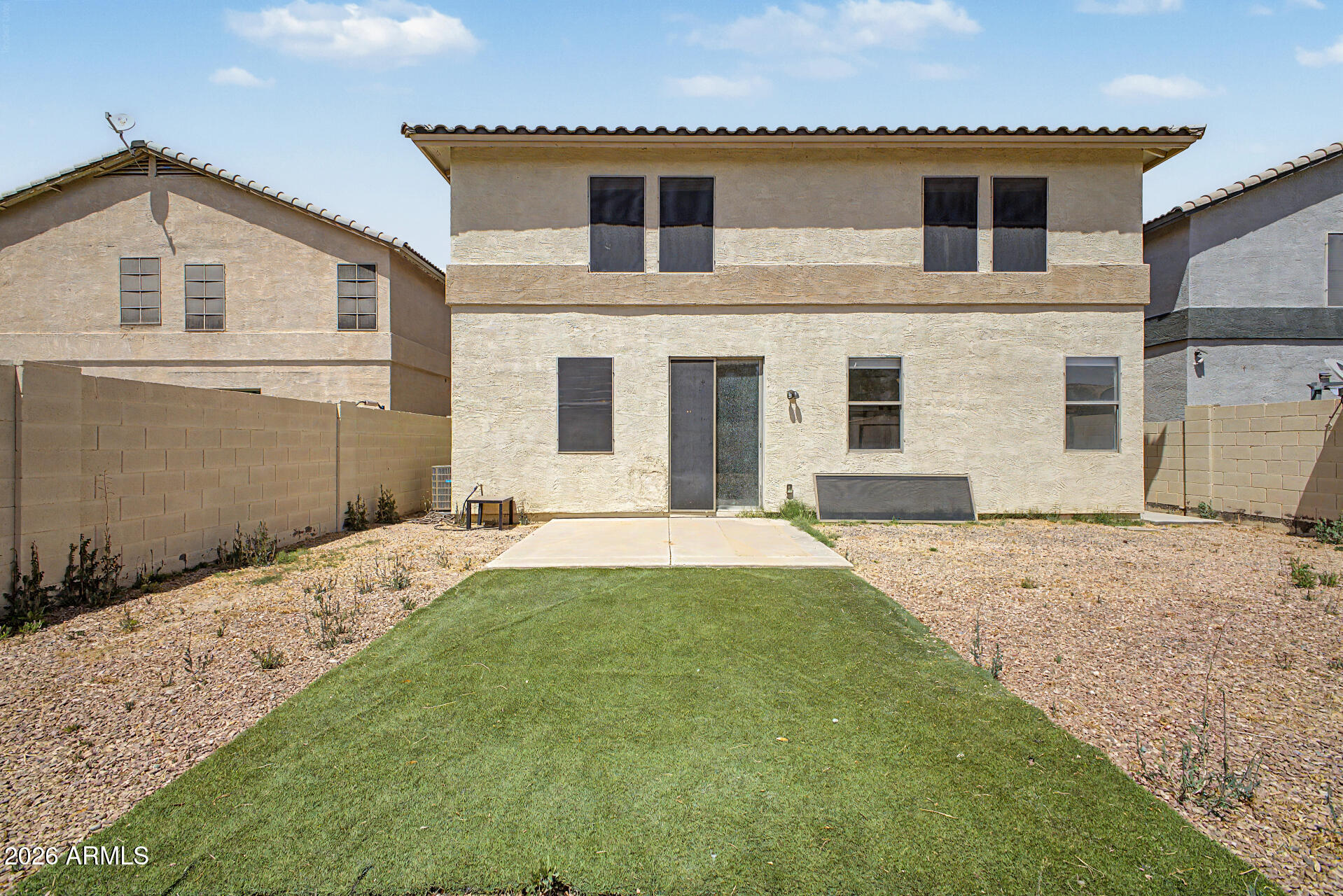 45571 West Tucker Road Maricopa, AZ 85139 - Photo 57 of 61 a front view of a house with a yard