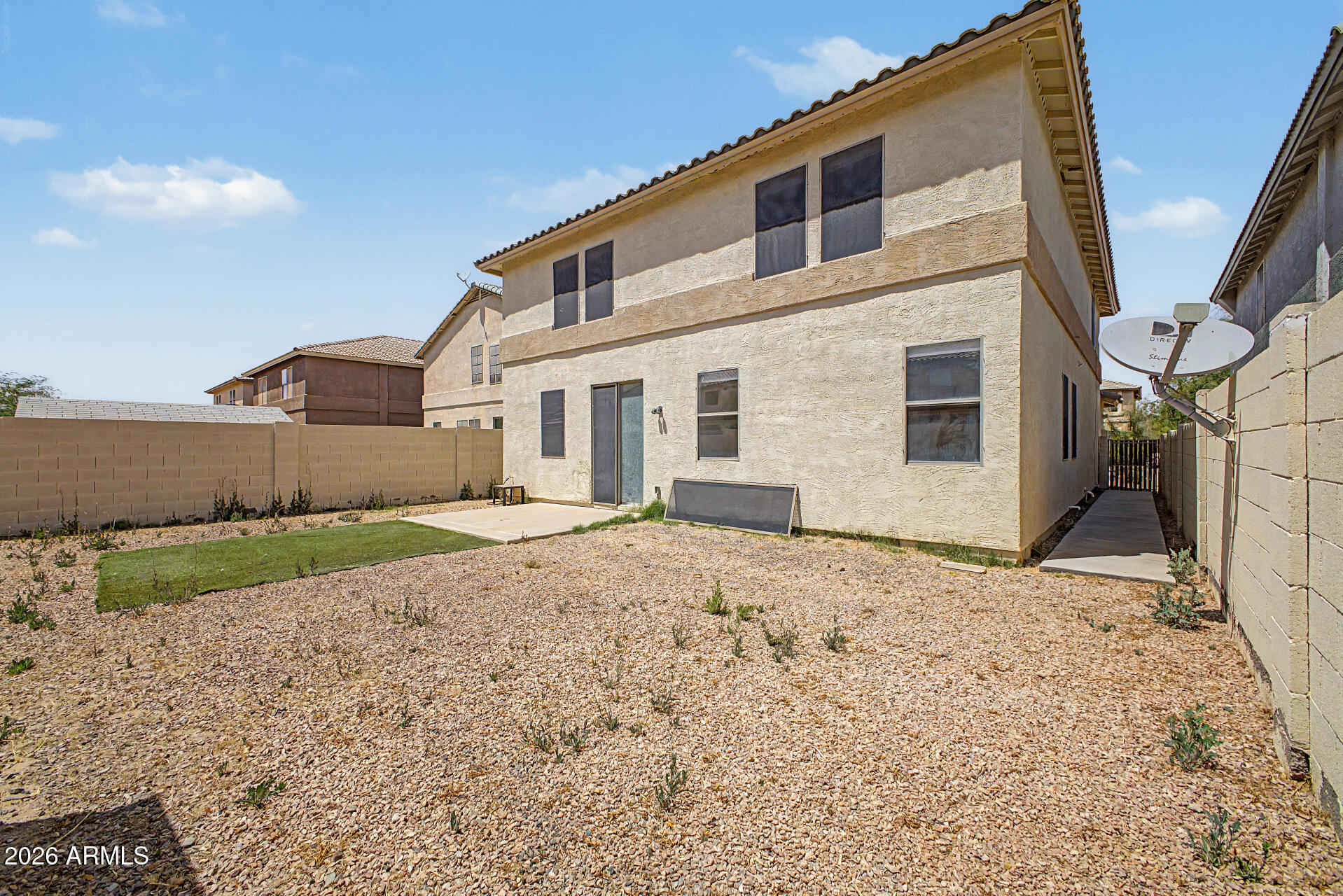 45571 West Tucker Road Maricopa, AZ 85139 - Photo 59 of 61 a front view of a house with a yard
