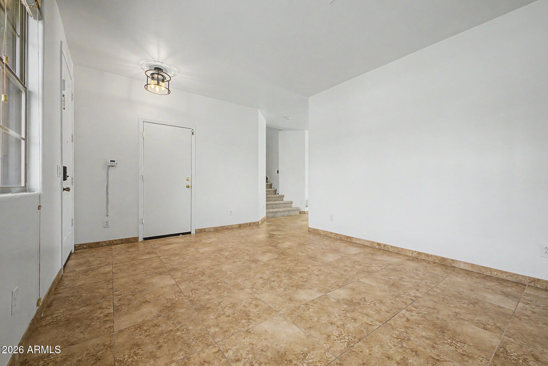 45571 West Tucker Road Maricopa, AZ 85139 - Photo 7 of 61 a view of an empty room