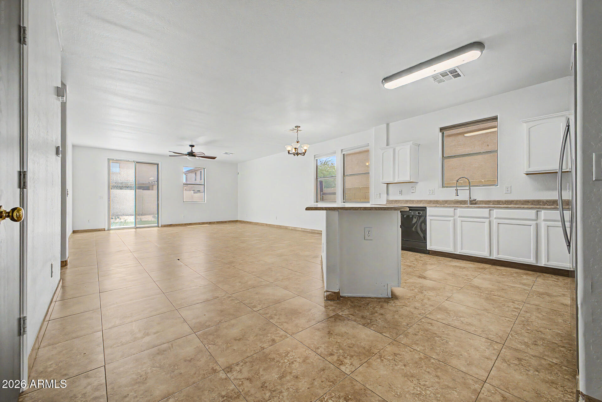 45571 West Tucker Road Maricopa, AZ 85139 - Photo 9 of 61 a view of a kitchen with a sink