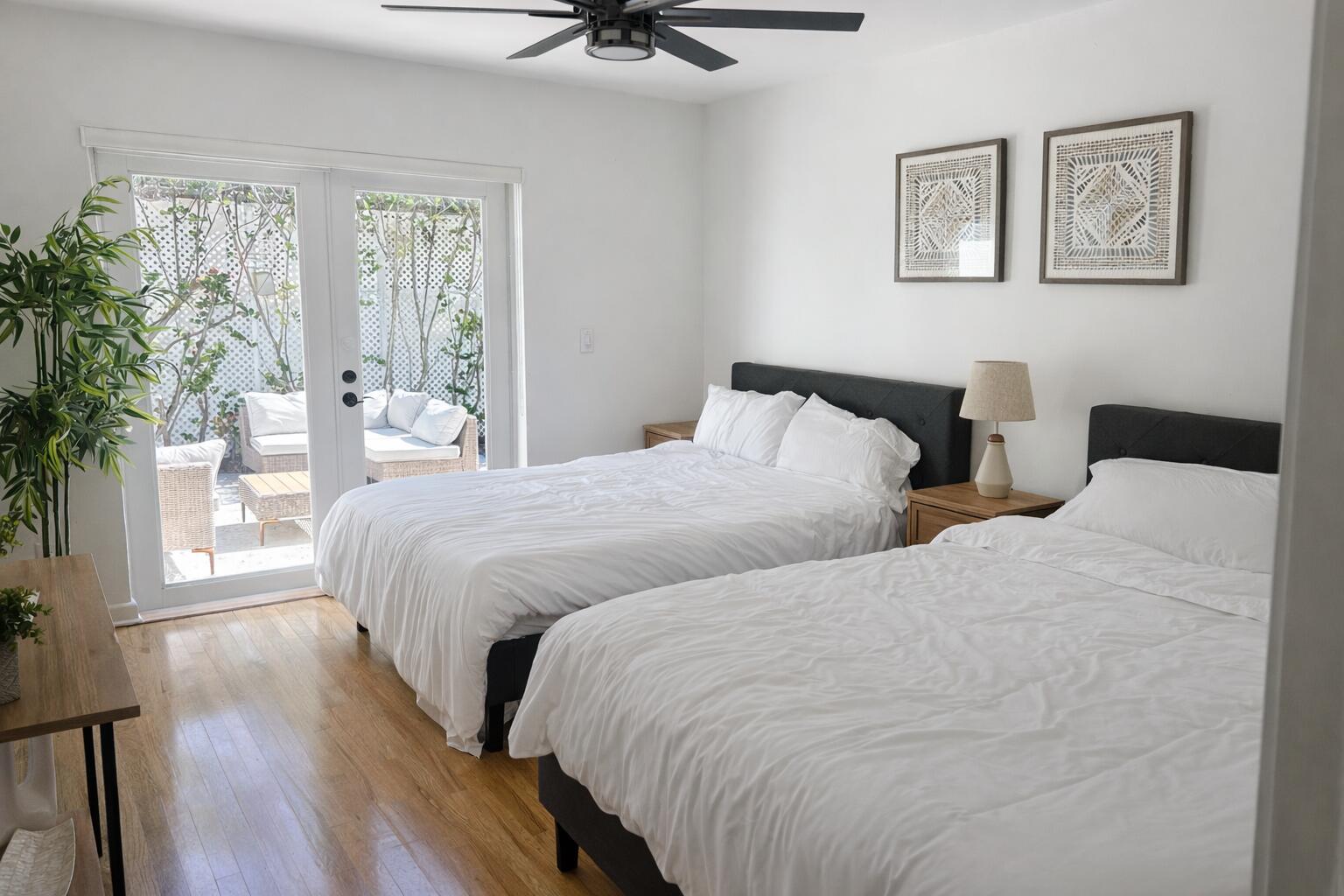 248 Cortez Road West Palm Beach, FL 33405 - Photo 15 of 17 a bedroom with two beds and a large window