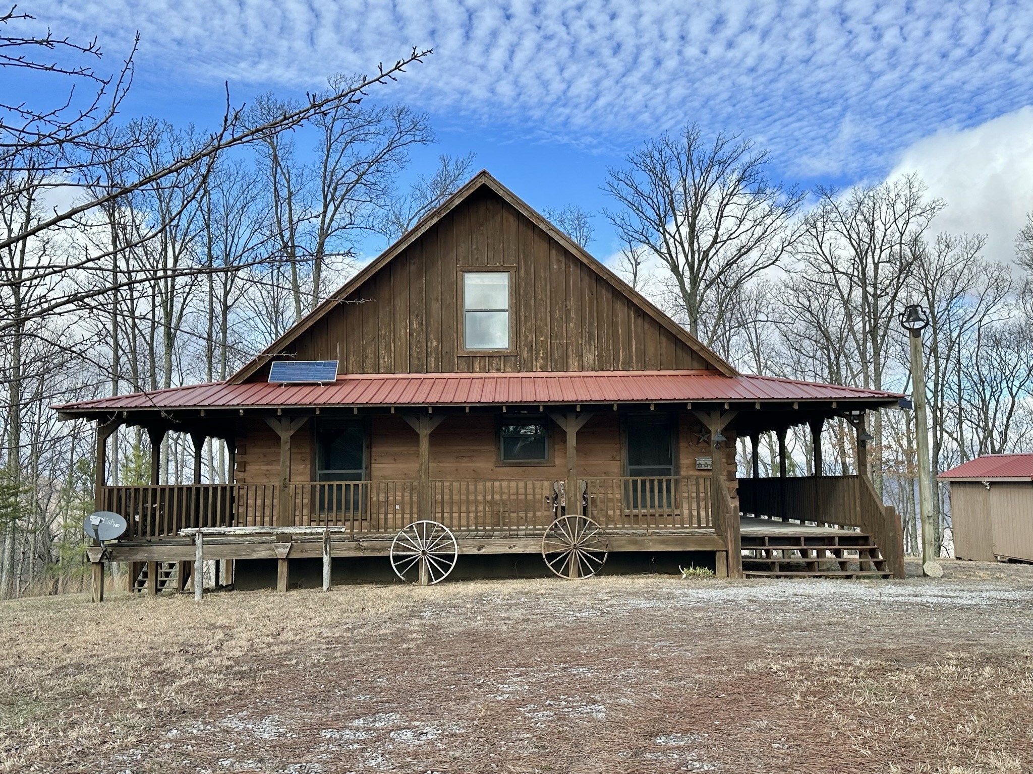 1229 Ayers Road Rock Island, TN 38581 - Photo 11 of 69 a front view of a house with glass windows
