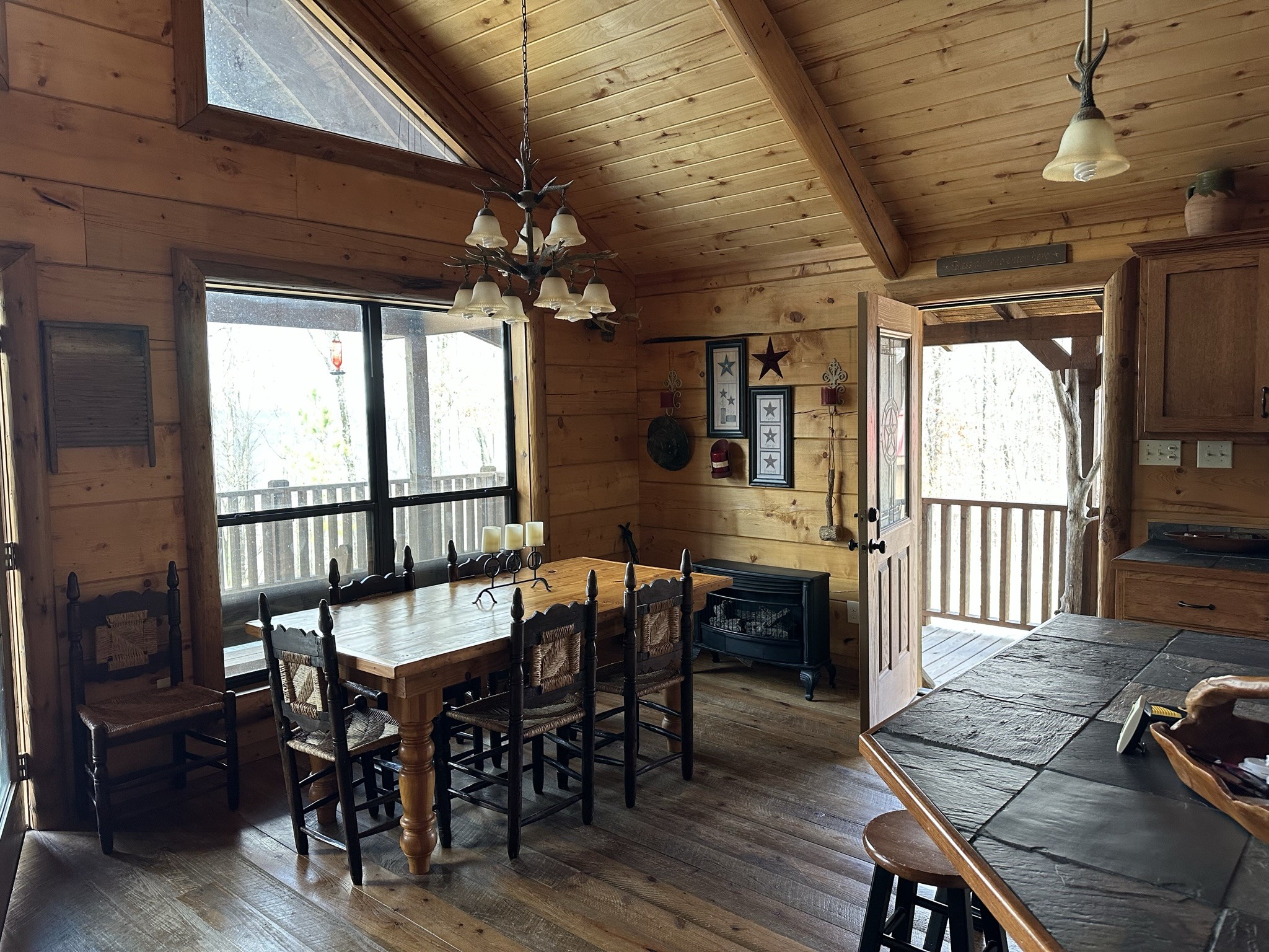1229 Ayers Road Rock Island, TN 38581 - Photo 30 of 69 a view of a dining room with furniture window and wooden floor