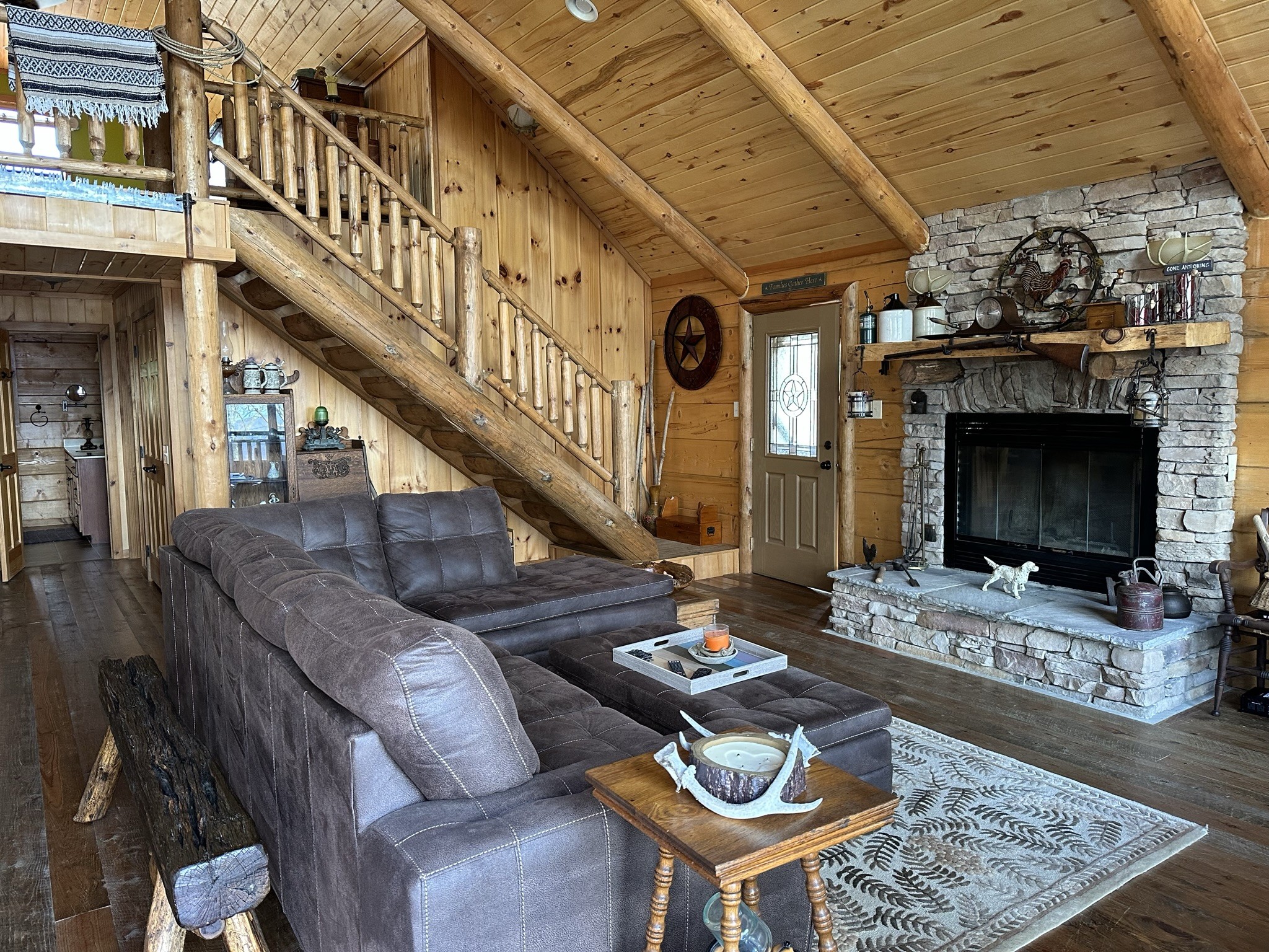 1229 Ayers Road Rock Island, TN 38581 - Photo 32 of 69 a living room with couches chairs and a fireplace