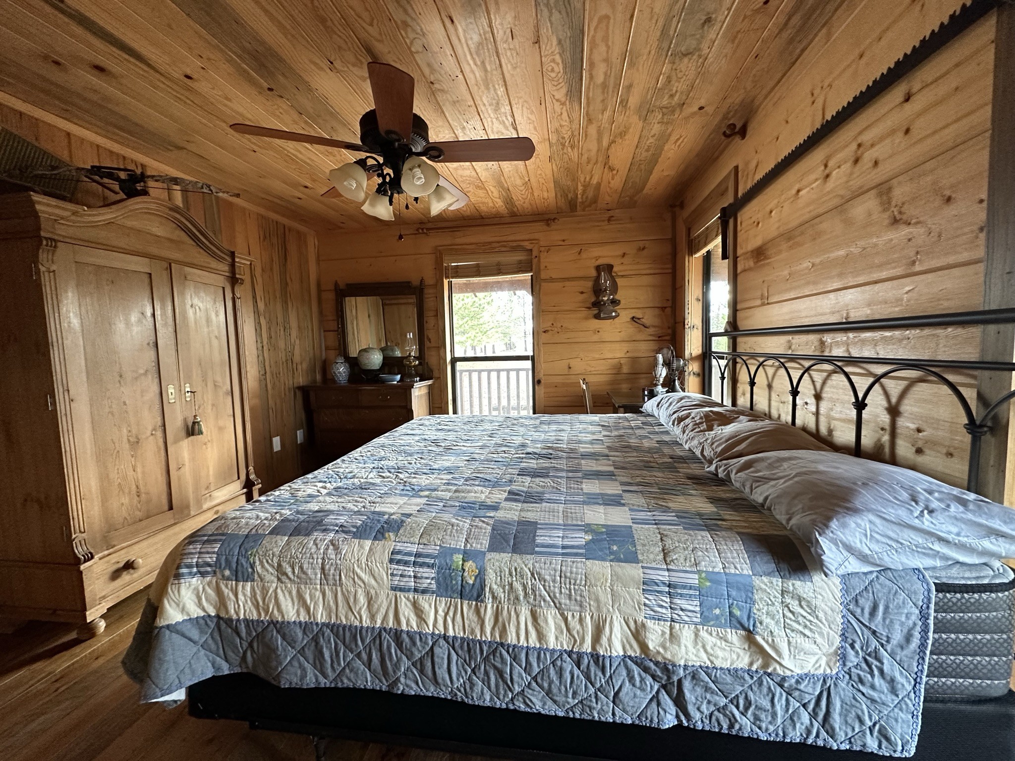 1229 Ayers Road Rock Island, TN 38581 - Photo 39 of 69 a bedroom with a bed window and a walk in closet