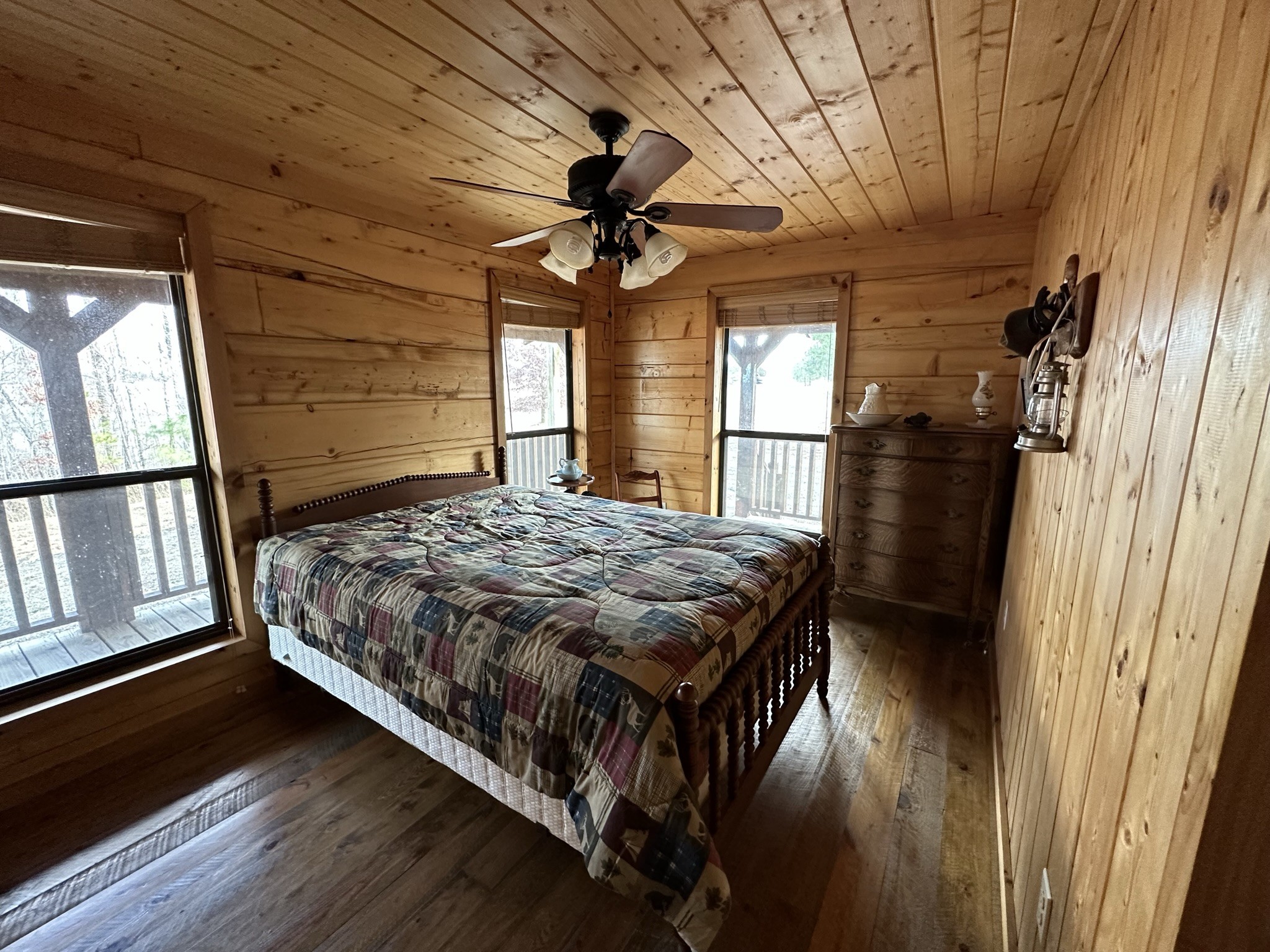 1229 Ayers Road Rock Island, TN 38581 - Photo 43 of 69 a bedroom with a bed and wooden floor