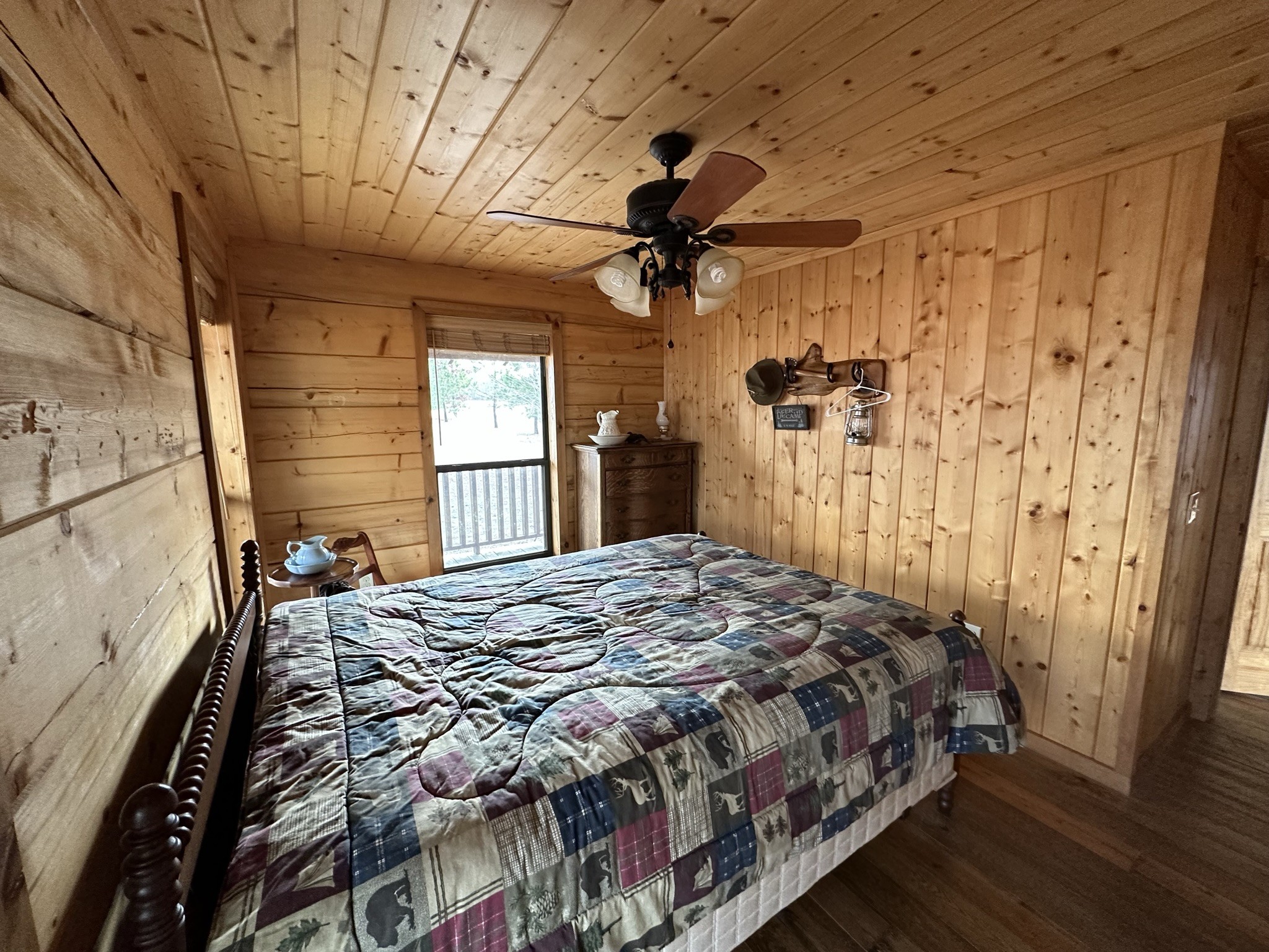 1229 Ayers Road Rock Island, TN 38581 - Photo 44 of 69 a bedroom with a bed dresser and a window