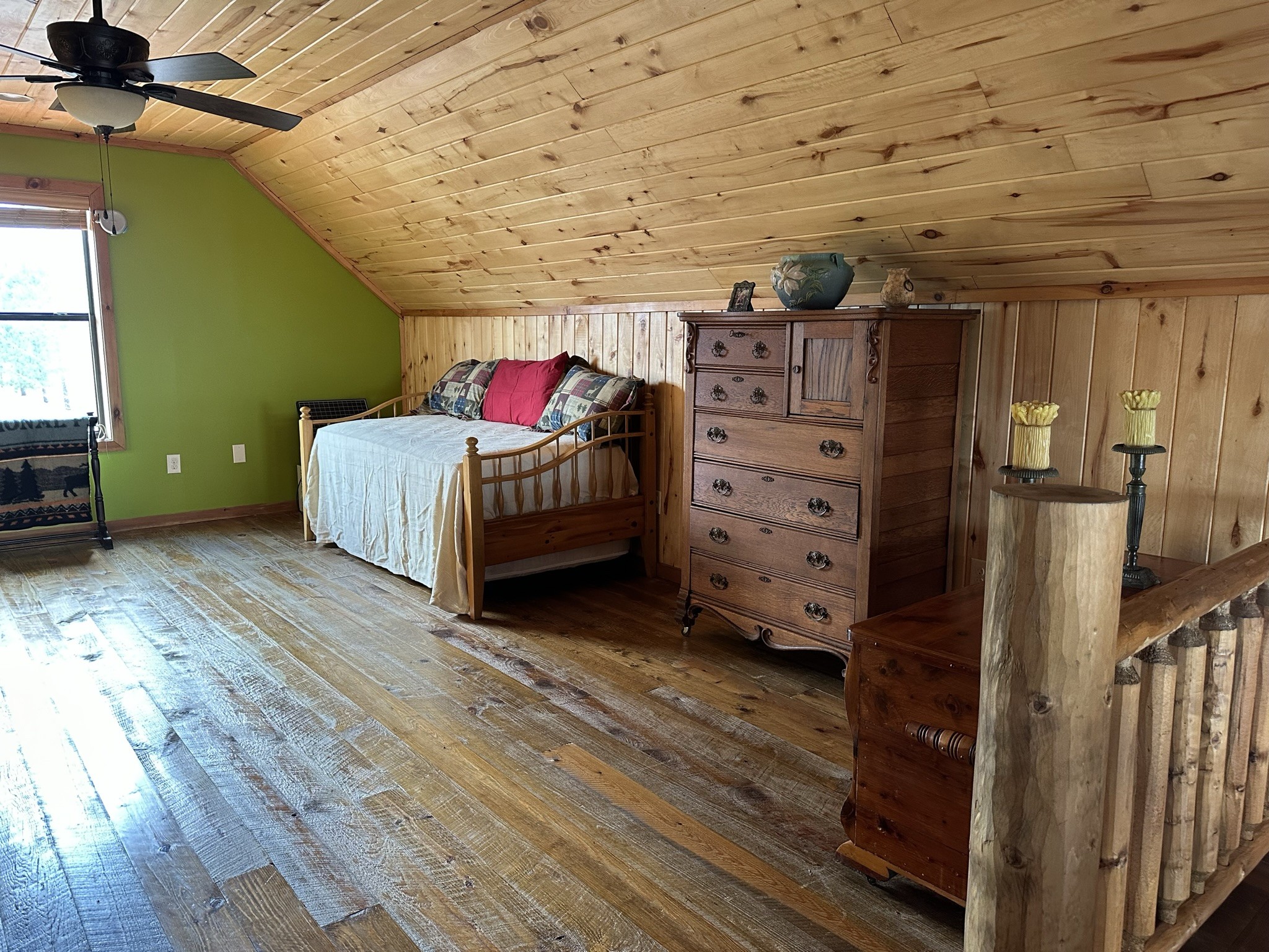 1229 Ayers Road Rock Island, TN 38581 - Photo 47 of 69 a view of a bedroom with a bed and wooden floor