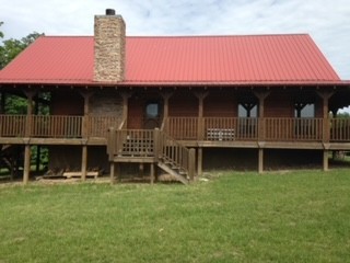 1229 Ayers Road Rock Island, TN 38581 - Photo 5 of 69 a front view of a house with garden