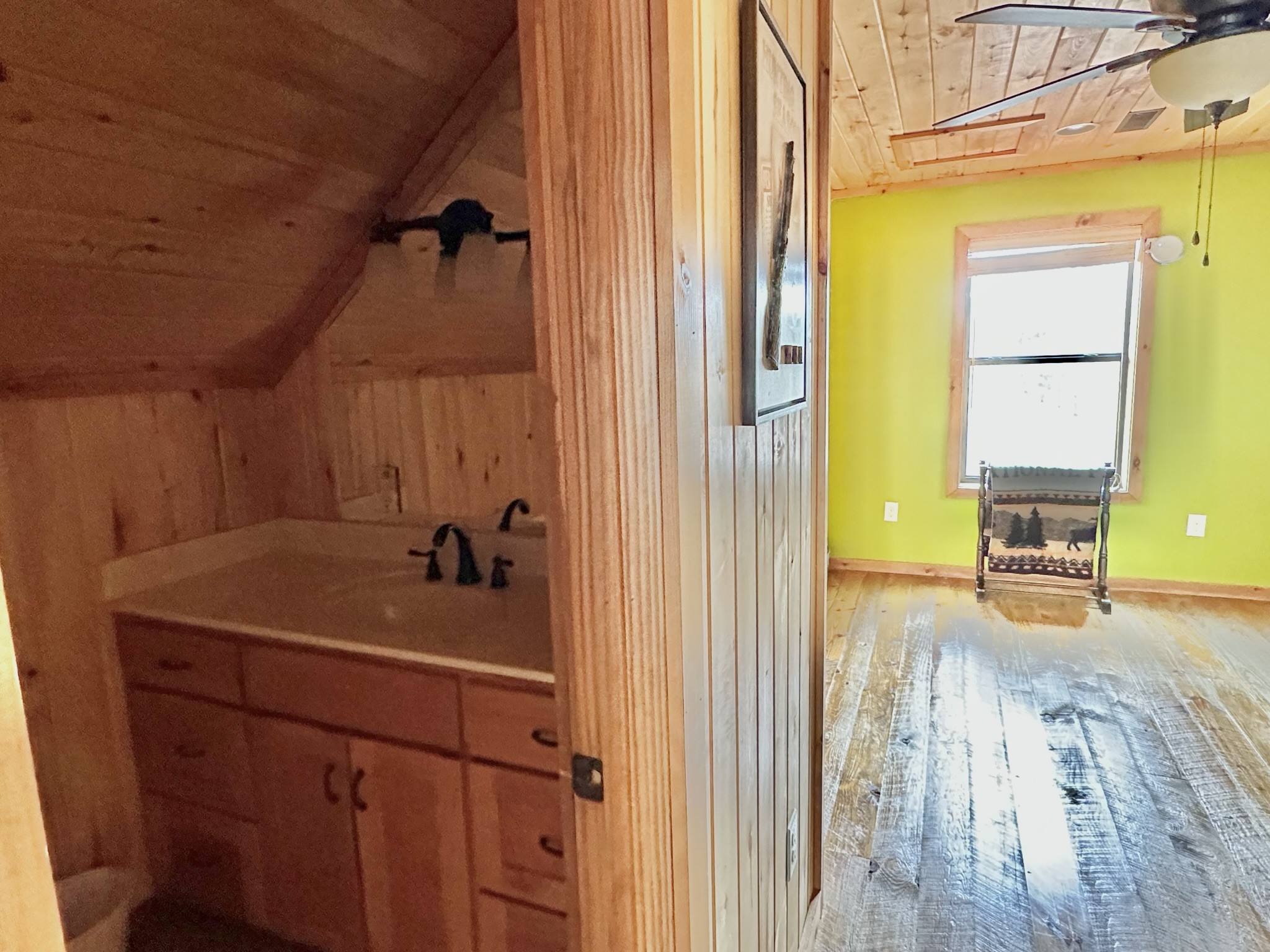 1229 Ayers Road Rock Island, TN 38581 - Photo 51 of 69 a bathroom with a sink and a mirror