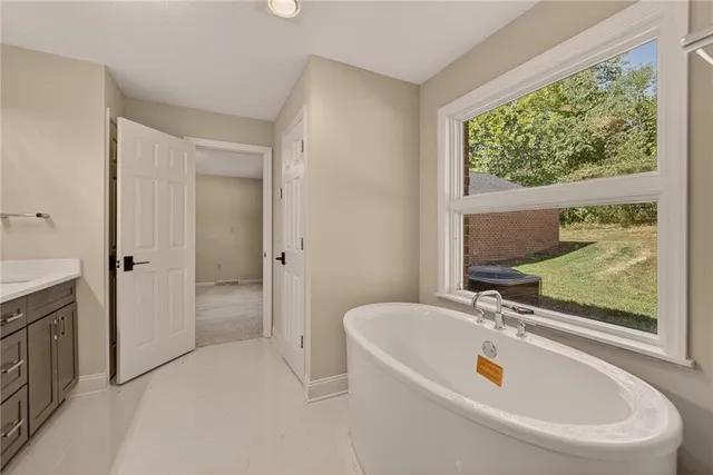 a bathroom with a sink and a bathtub