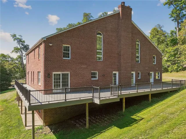 a front view of a house with swimming pool