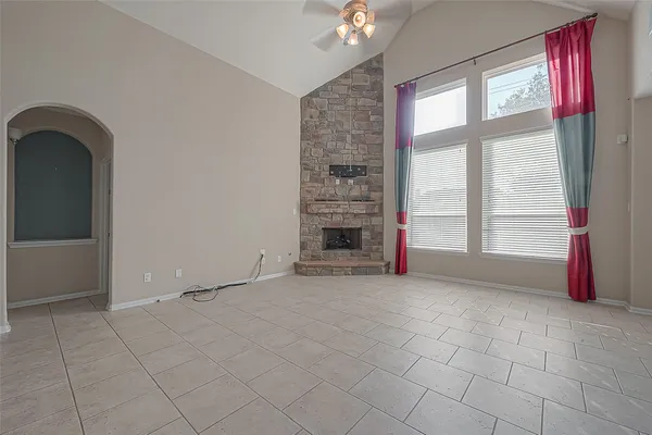 a kitchen with stainless steel appliances granite countertop a sink and a stove