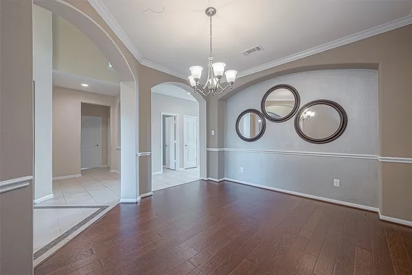 a view of a hallway with closet and entryway