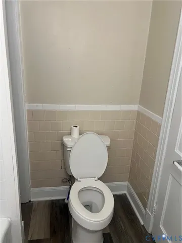 a bathroom with a toilet and a sink