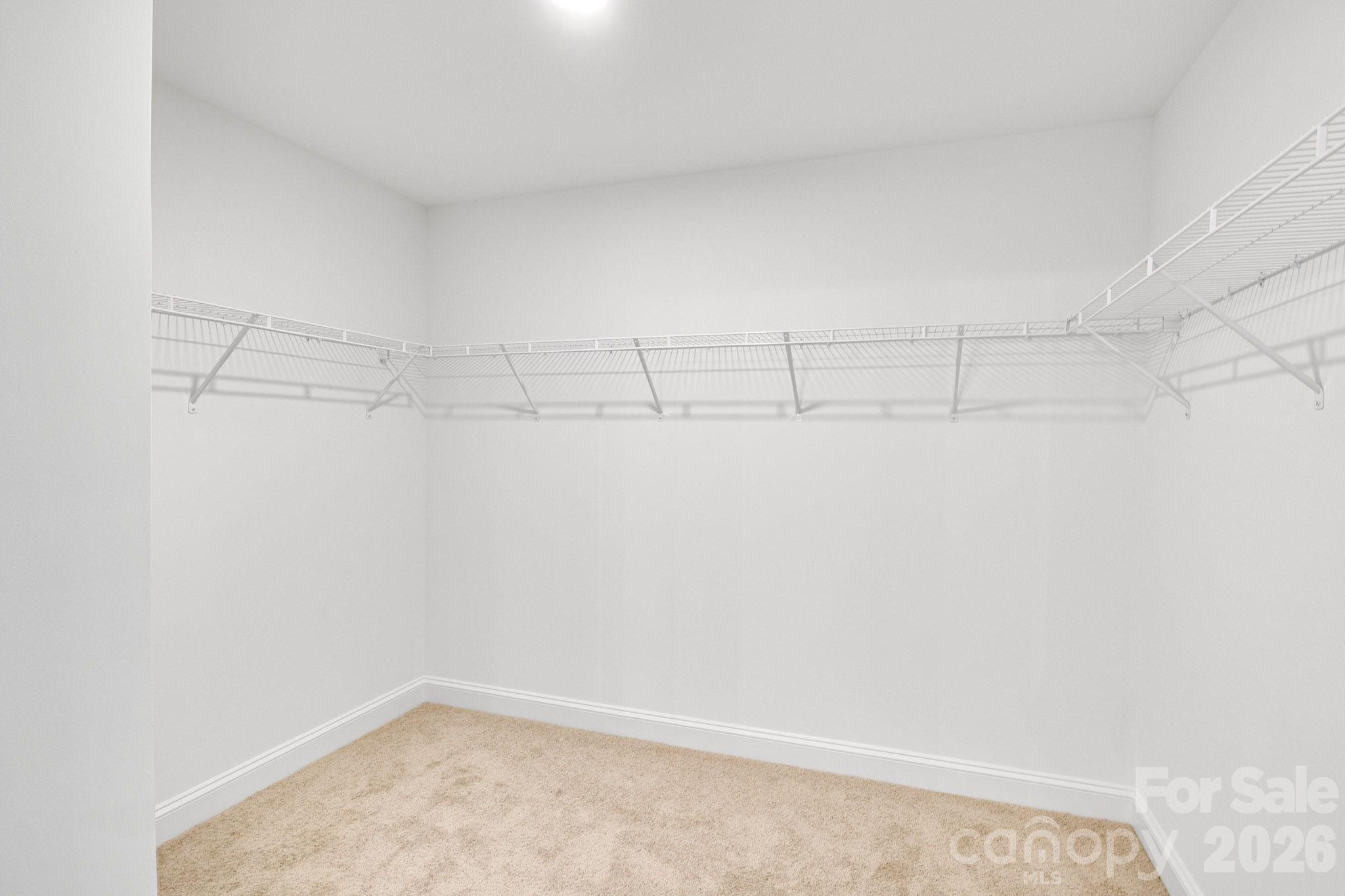 1335 Winged Way, Unit 4 Kannapolis, NC 28083 - Photo 17 of 29 a view of a room with racks on the wall