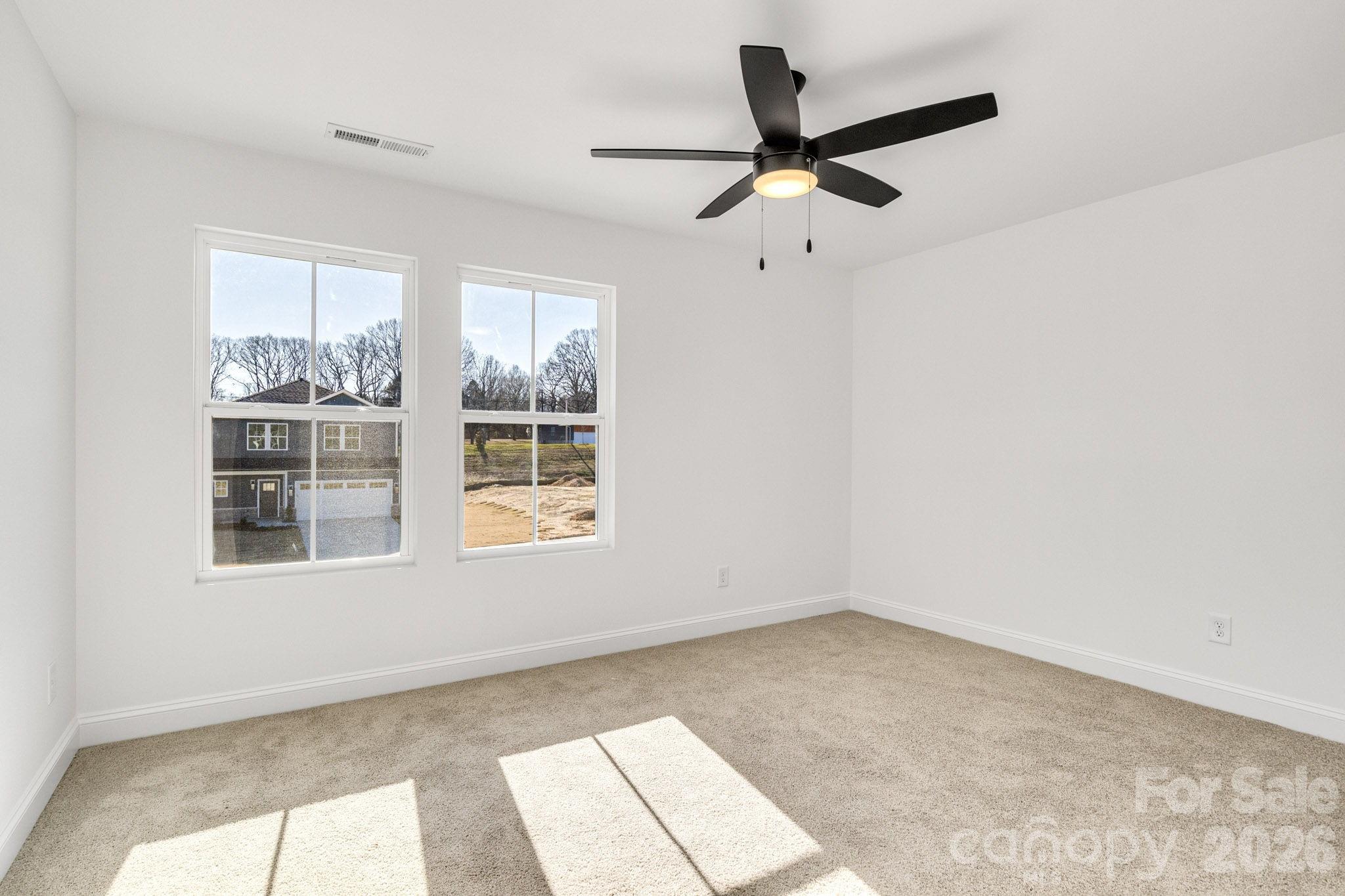 1335 Winged Way, Unit 4 Kannapolis, NC 28083 - Photo 24 of 29 a view of an empty room with a window