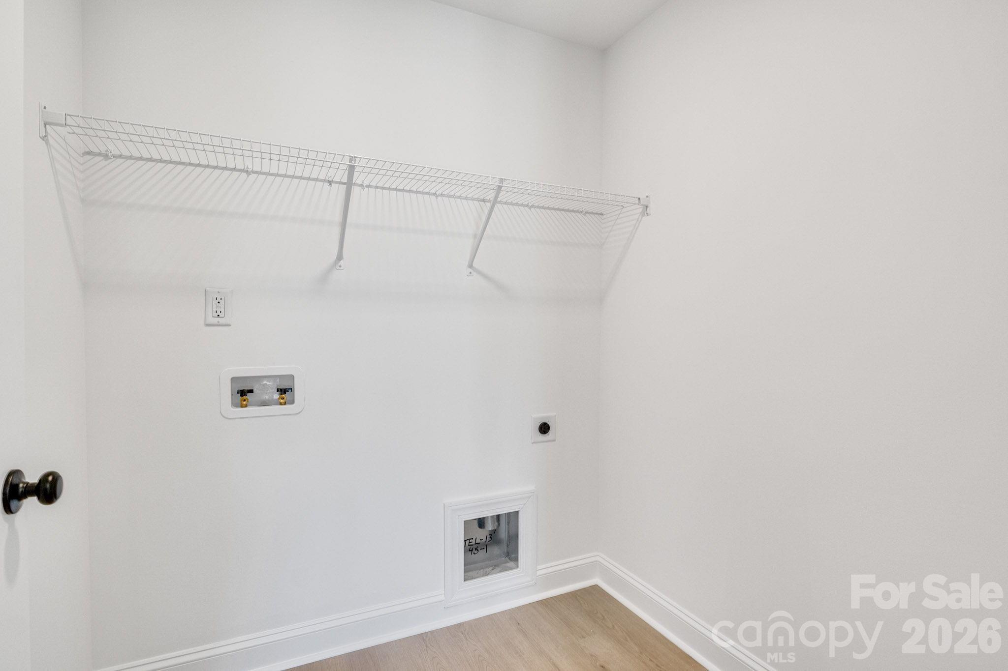 1335 Winged Way, Unit 4 Kannapolis, NC 28083 - Photo 27 of 29 a view of a room with racks on the wall