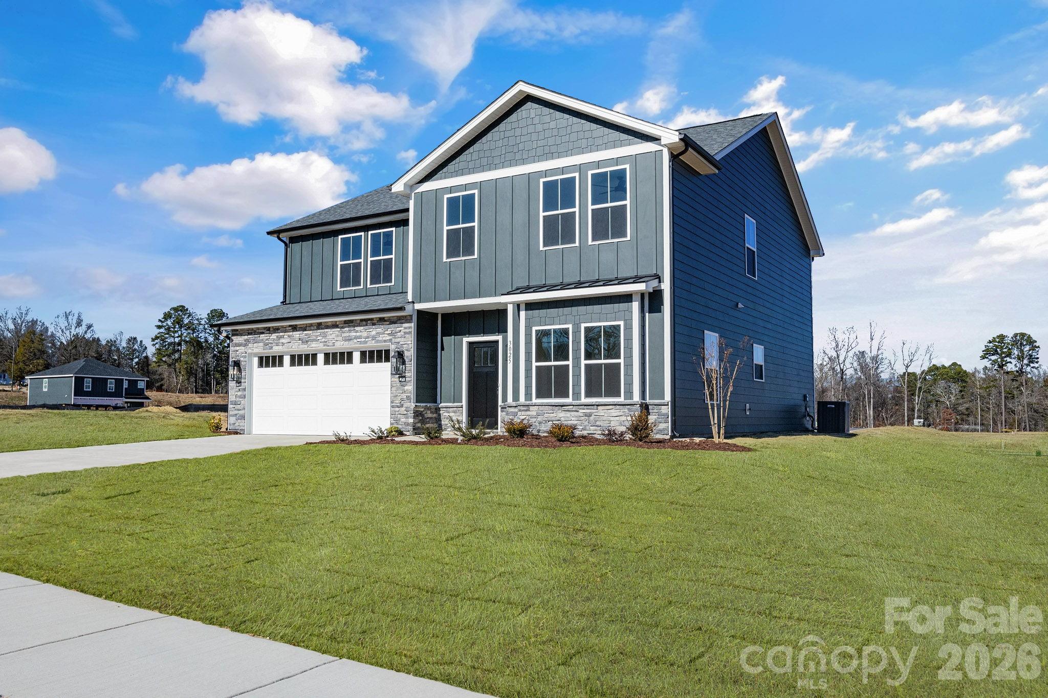 1335 Winged Way, Unit 4 Kannapolis, NC 28083 - Photo 6 of 29 a big house with a big yard and more windows