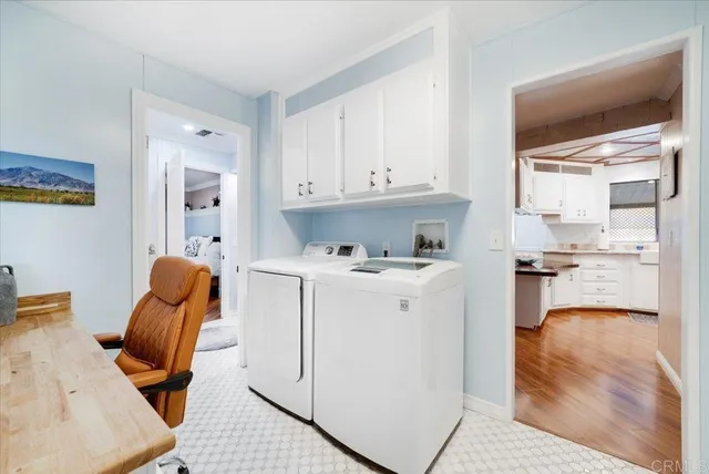 a view of kitchen with cabinets and outdoor view