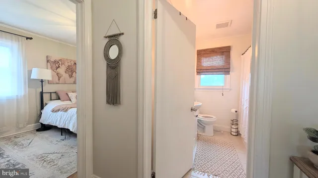 a en suite bathroom with a toilet