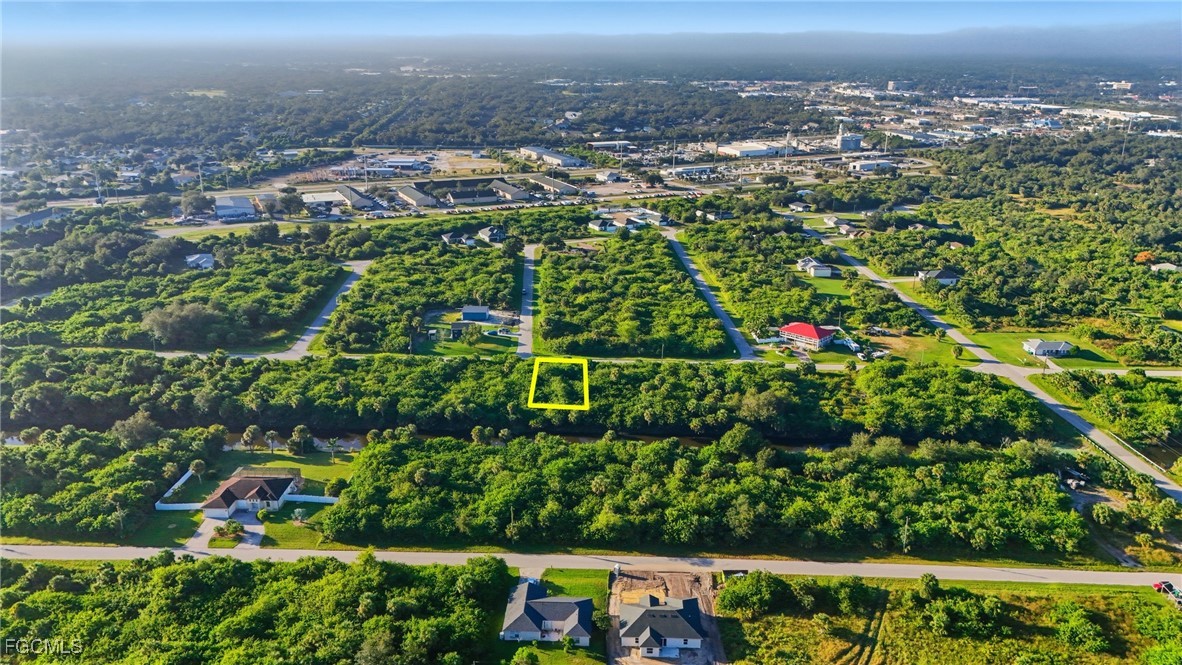 346 Rutland Circle Port Charlotte, FL 33954 - Photo 22 of 22 an aerial view of residential houses with cars and trees