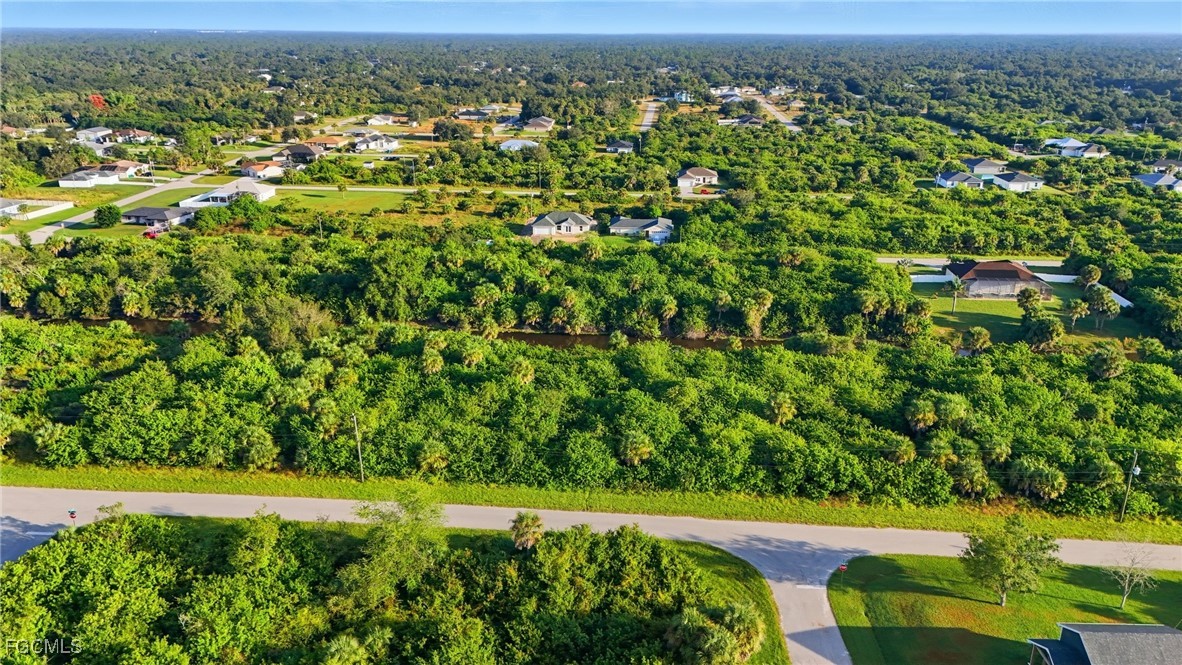346 Rutland Circle Port Charlotte, FL 33954 - Photo 3 of 22 an aerial view of a houses with a yard
