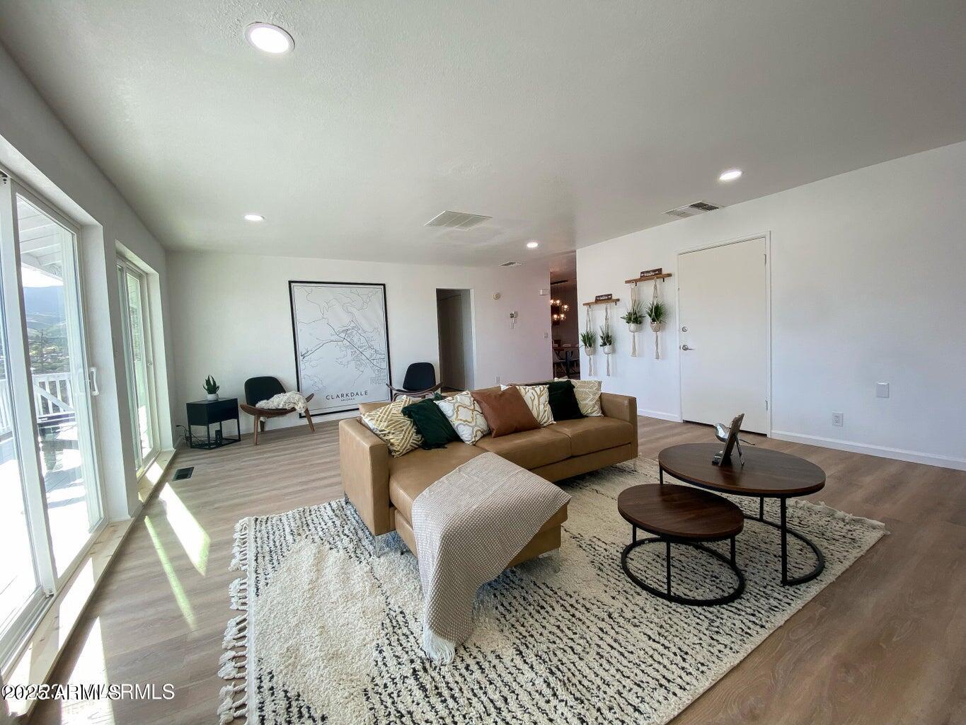 900 Rabbit Run Clarkdale, AZ 86324 - Photo 22 of 41 a living room with furniture and a rug