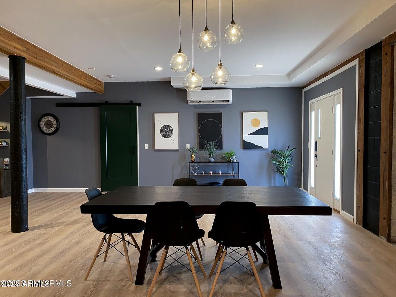 900 Rabbit Run Clarkdale, AZ 86324 - Photo 35 of 41 a view of a dining room with furniture and wooden floor