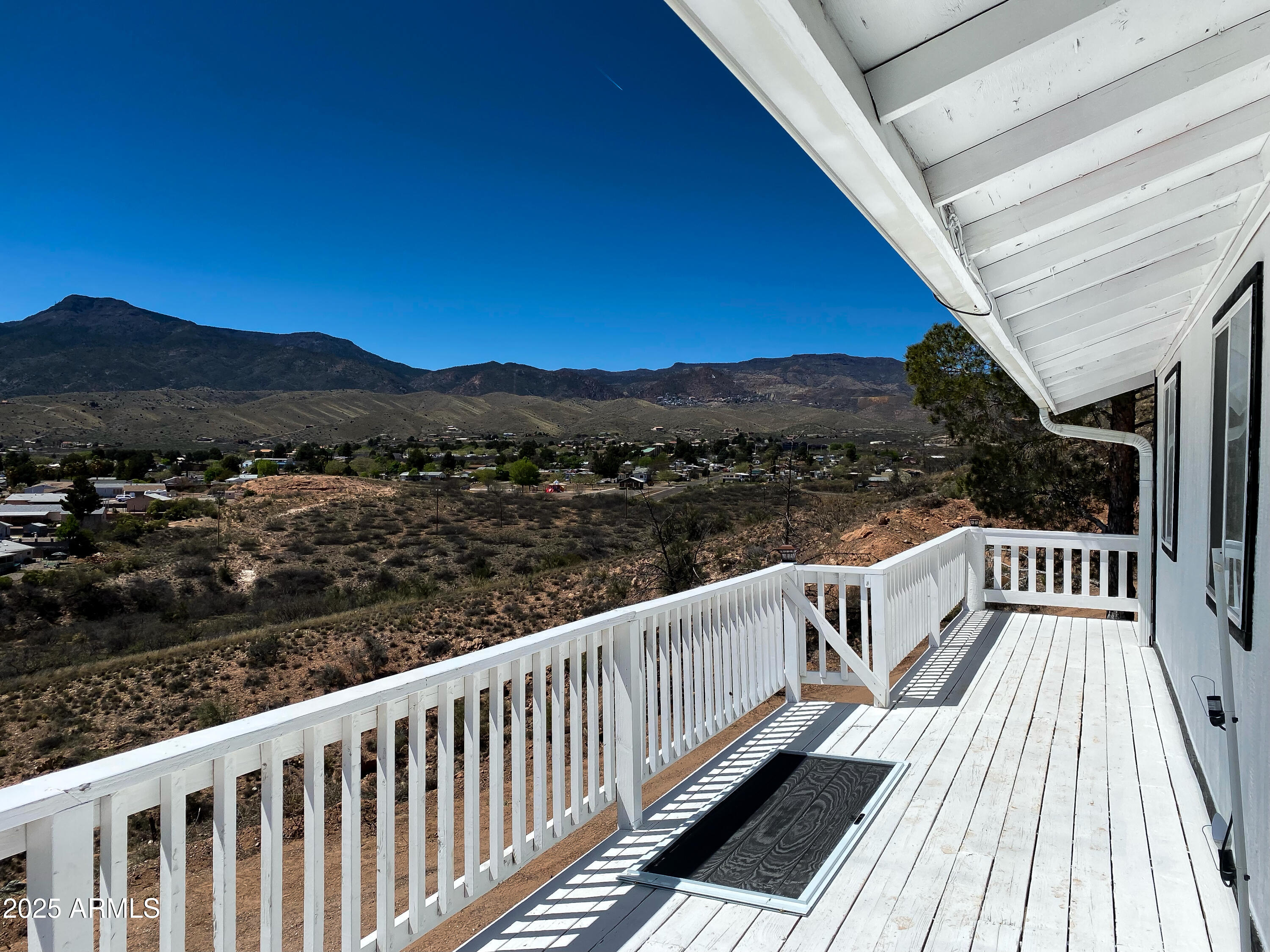 900 Rabbit Run Clarkdale, AZ 86324 - Photo 39 of 41 a view of balcony with wooden floor and fence