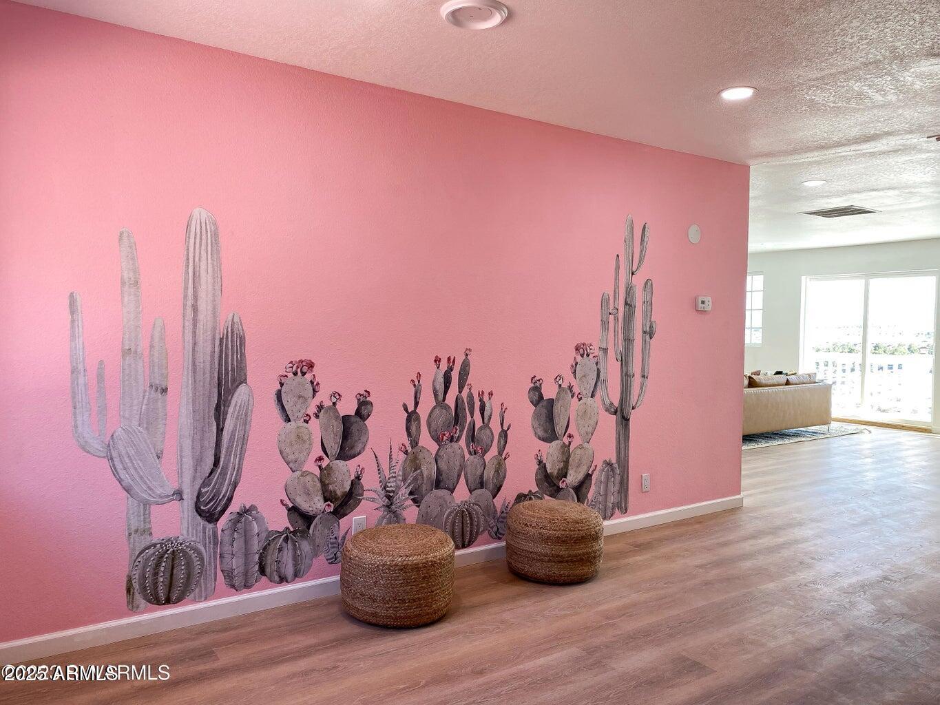 900 Rabbit Run Clarkdale, AZ 86324 - Photo 8 of 41 a view of a room with a large window and wooden floor
