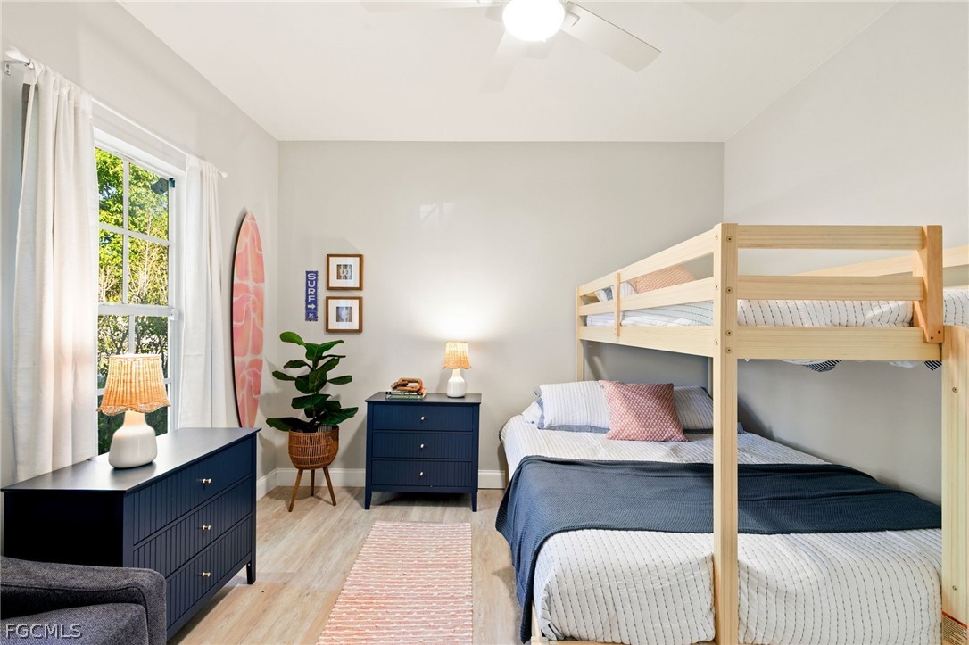 317 3rd Avenue Marco Island, FL 34145 - Photo 17 of 29 a bedroom with a bed and a window