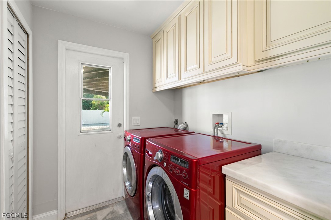 317 3rd Avenue Marco Island, FL 34145 - Photo 22 of 29 a utility room with dryer and washer