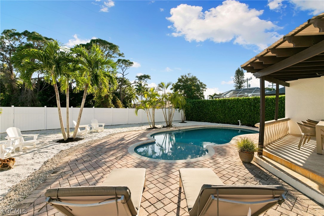 317 3rd Avenue Marco Island, FL 34145 - Photo 25 of 29 a view of a patio with swimming pool