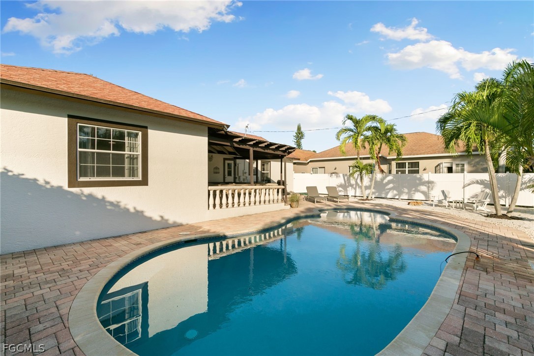 317 3rd Avenue Marco Island, FL 34145 - Photo 29 of 29 a view of a swimming pool with an outdoor seating