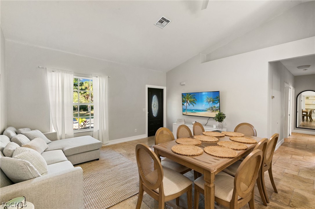 317 3rd Avenue Marco Island, FL 34145 - Photo 4 of 29 a view of a dining room with furniture and window