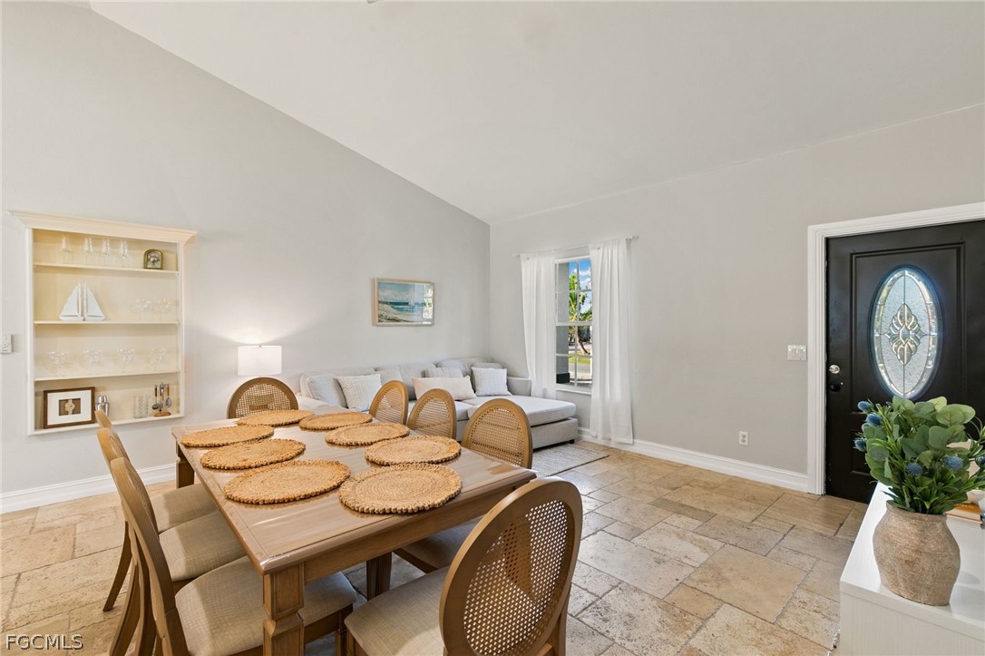 317 3rd Avenue Marco Island, FL 34145 - Photo 5 of 29 a dining room with furniture and window